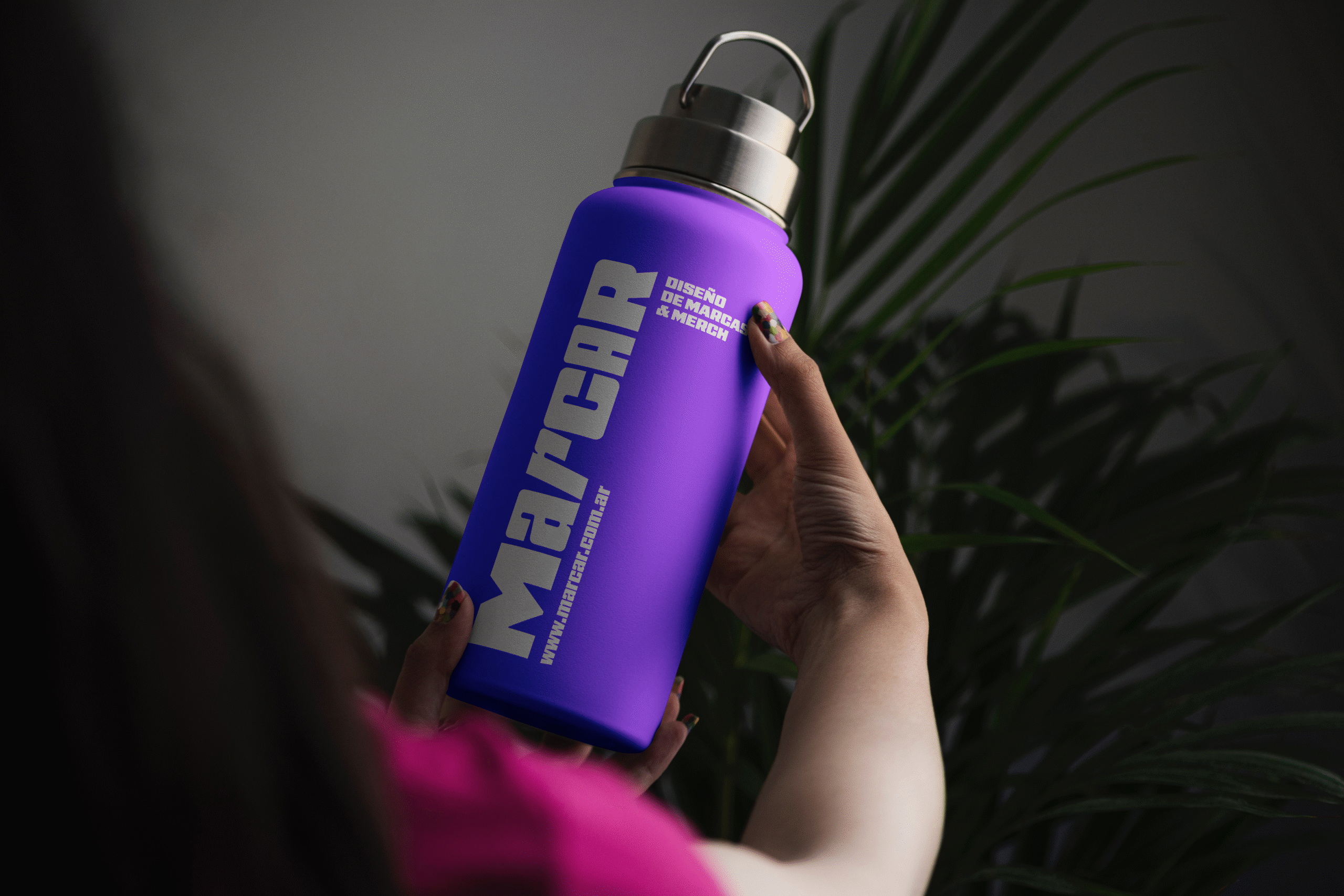 Free Woman Holding Bottle Mockup